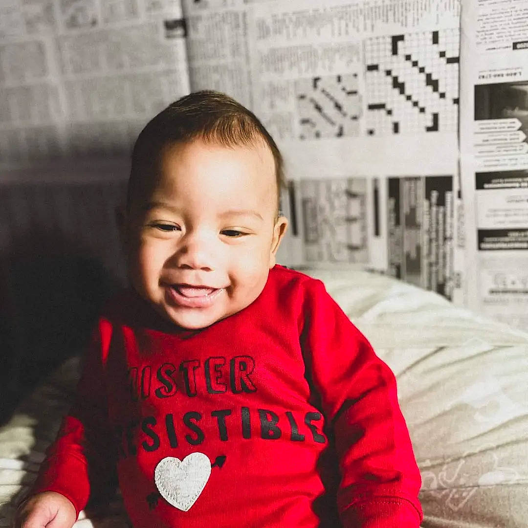 Armoni joined the competition — help win amazing prizes! baby, baby_toddler_clothing, black, child, design, font, fun, happy, human, magenta, person, room, sitting, skin, sleeve, smile, snapshot, standing, t_shirt, toddler