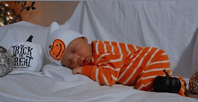 Armoni is registered to the contest to win money with this photo: baby, baby_products, baby_sleeping, baby_toddler_clothing, bag, bedding, bedtime, child, comfort, event, eye, hat, headwear, illustration, linens, luggage_and_bags, nap, pattern, person, room
