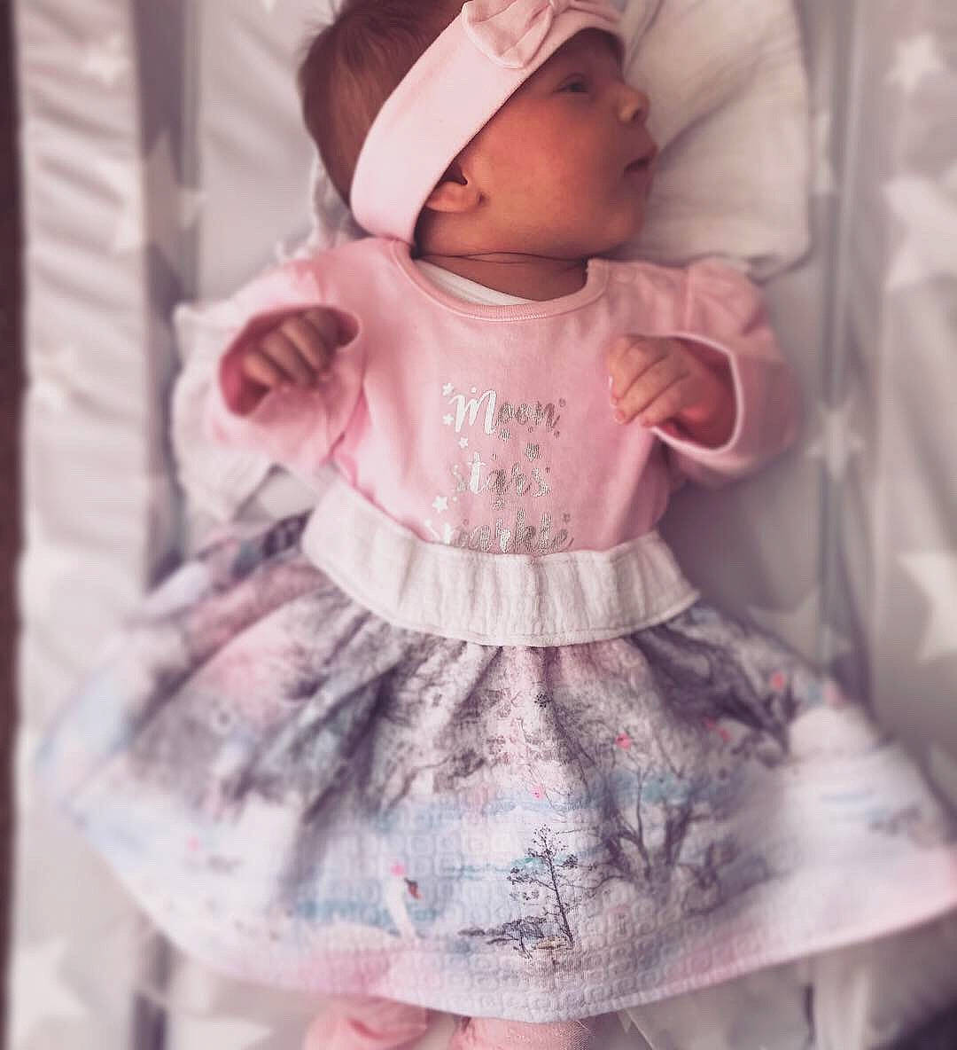 Elsa joined the competition — help win amazing prizes! baby, baby_products, baby_toddler_clothing, child, doll, dress, headgear, pattern, person, pink, product, skin, sleeve, smile, textile, toddler, white