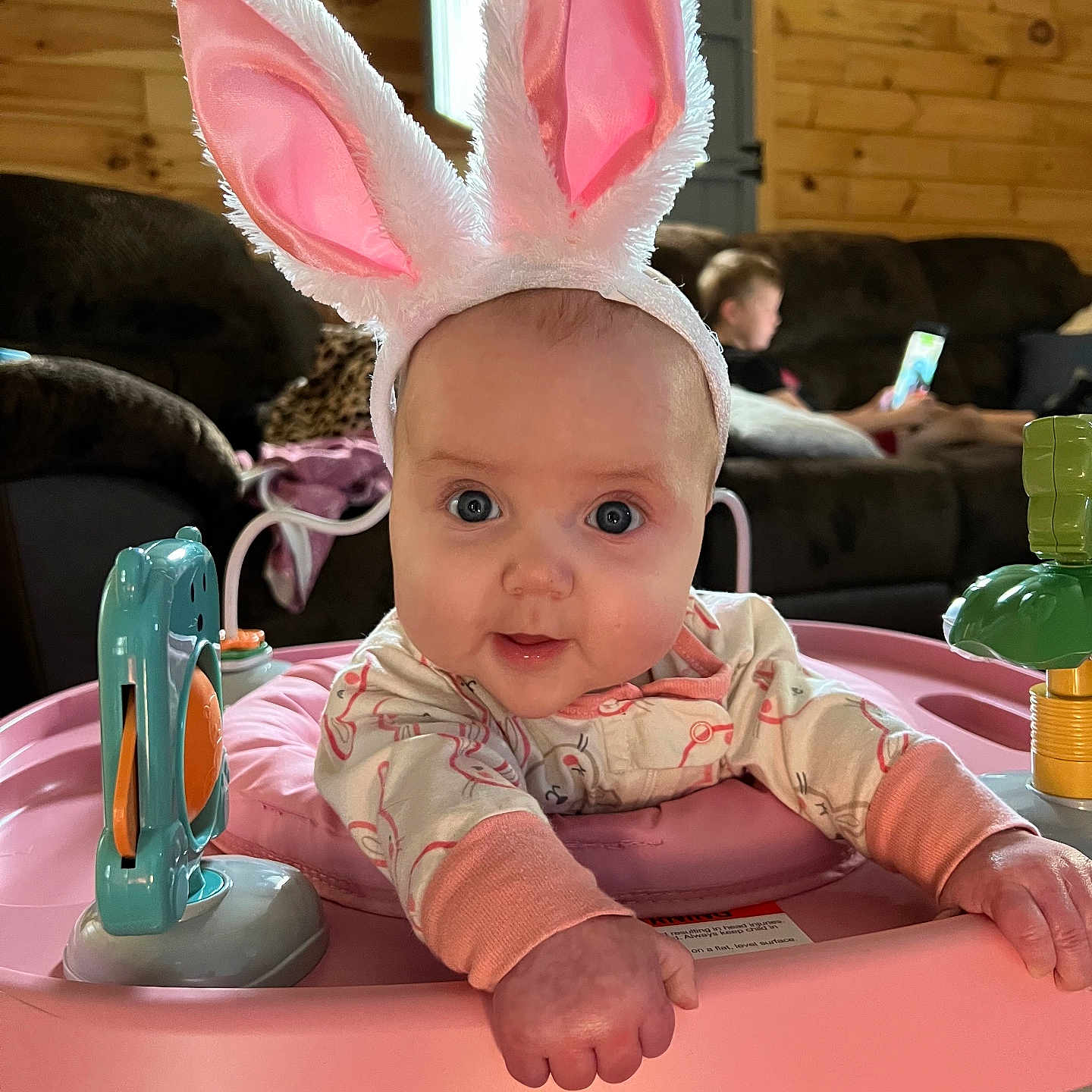 Milly is registered to the contest to win money with this photo: baby, clothing, cream, dessert, diningtable, electronics, face, food, furniture, hat, head, icing, indoors, interiordesign, mobilephone, person, phone, photography, portrait, table