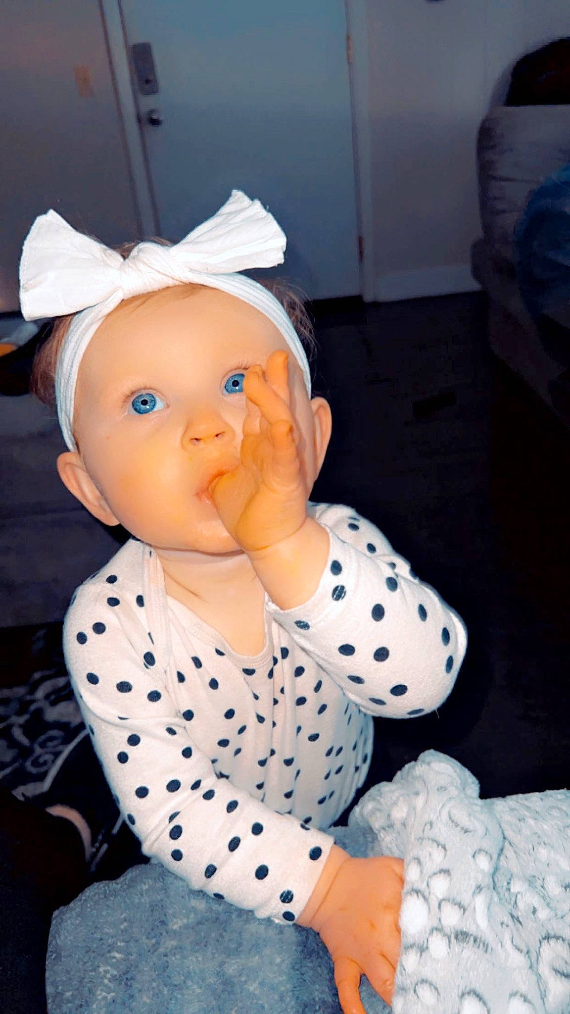 Arabella joined the competition — help win amazing prizes! baby_toddler_clothing, cap, carmine, child, costume, costume_hat, doll, fashion_accessory, fun, fur, pattern, person, polka_dot, sitting, sleeve, smile, textile, toddler, toy, white