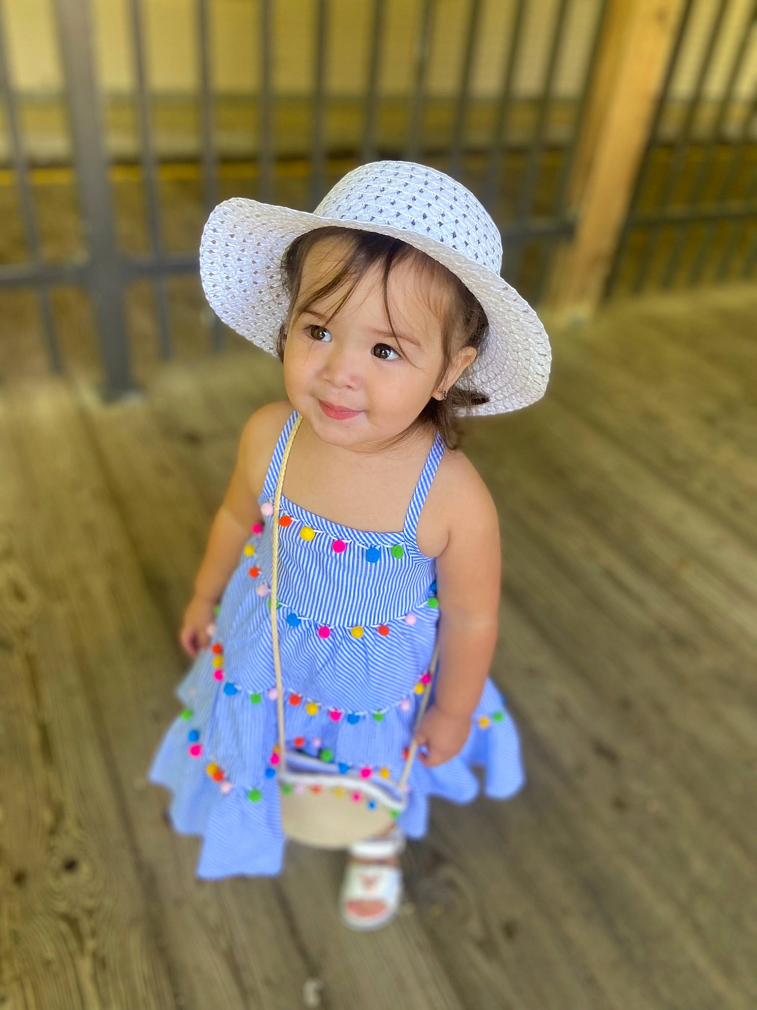 Annie joined the competition — help win amazing prizes! baby, baby_toddler_clothing, cap, child, dress, electric_blue, eye, fashion_accessory, flooring, fun, grass, happy, hat, joy, pattern, person, skin, sleeve, smile, sun_hat