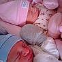 Coline Et Matthew a rejoint le concours — aidez-le/la à gagner de superbes lots ! newborn, baby, sleeping, infant, pink_hat, blue_hat, blanket, cozy, cute, soft, peaceful, child, portrait, indoors, clothing, wearing_hat, closeup, resting, warm, twin