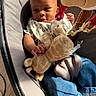 baby, infant, child, car_seat, plush_toy, giraffe, toy, bib, smiling, sitting, portrait, face, sunlight, indoor, clothing, denim, safety_harness, baby_gear, cozy, photography