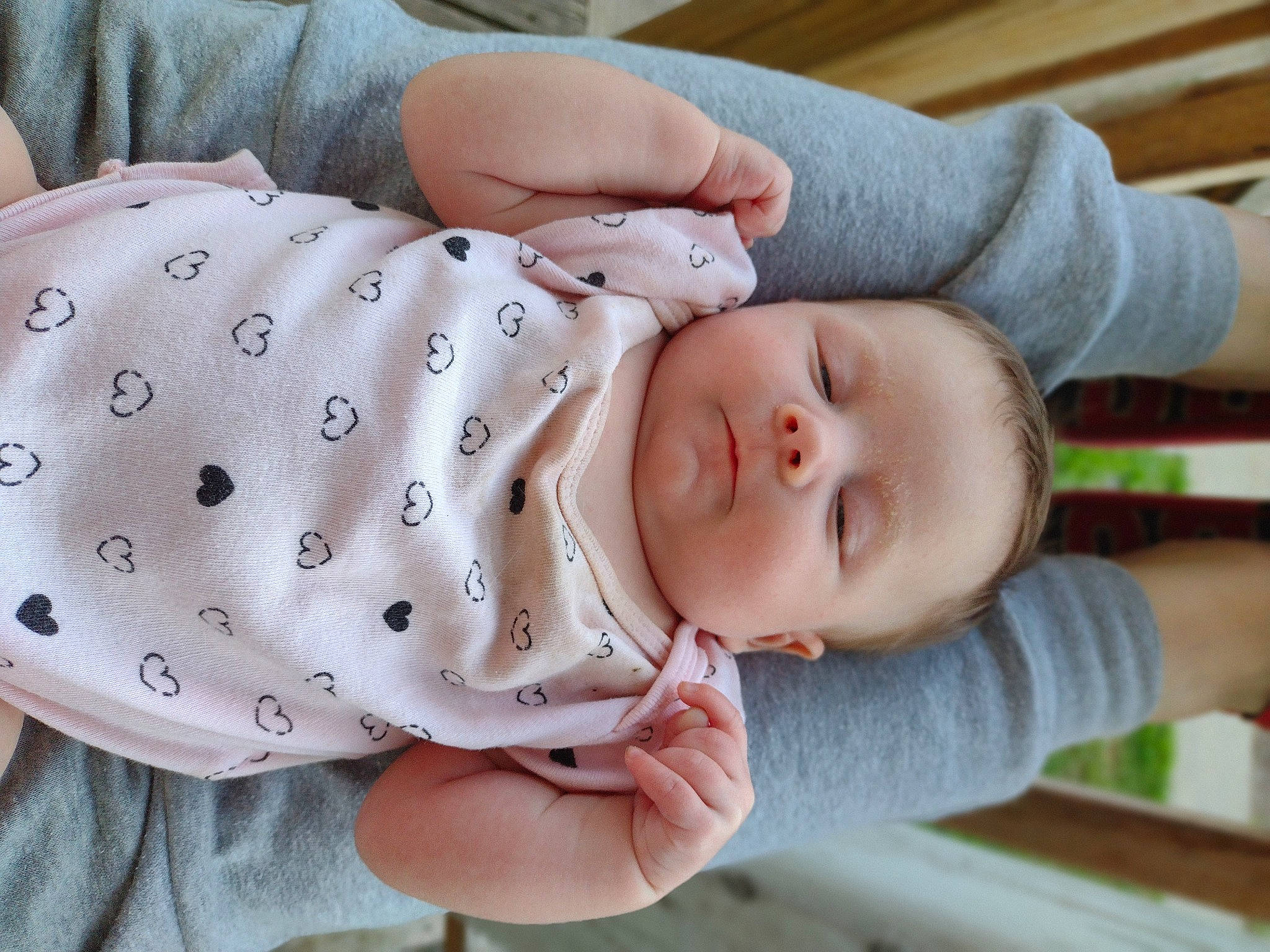 Georgia is registered to the contest to win money with this photo: baby, baby_toddler_clothing, cheek, child, comfort, face, finger, hand, headgear, human, lip, mammal, mouth, pattern, person, product, skin, sleeve, textile, toddler