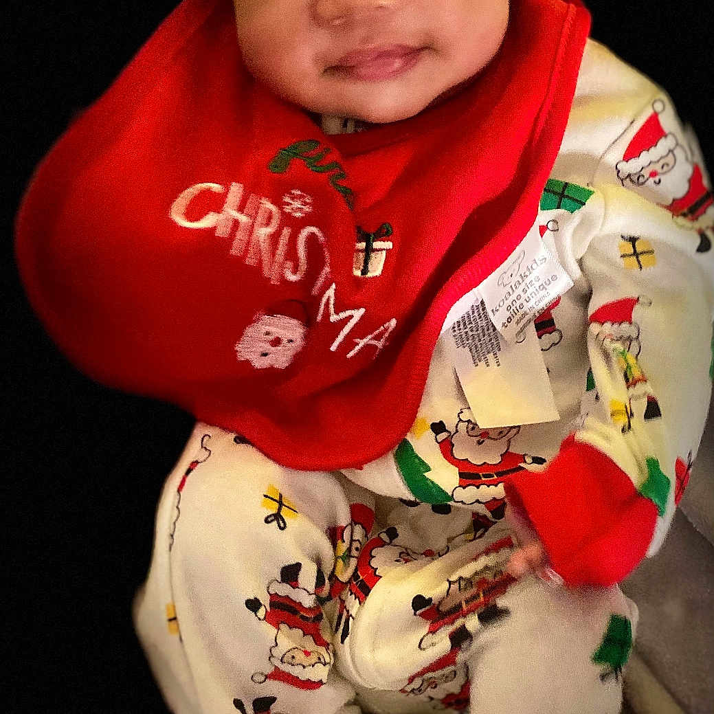 Jalynn joined the competition — help win amazing prizes! baby, blanket, bodypart, clothing, coat, face, happy, hat, head, knitwear, laughing, mouth, newborn, pajamas, person, photography, portrait, smile, sweater, teeth