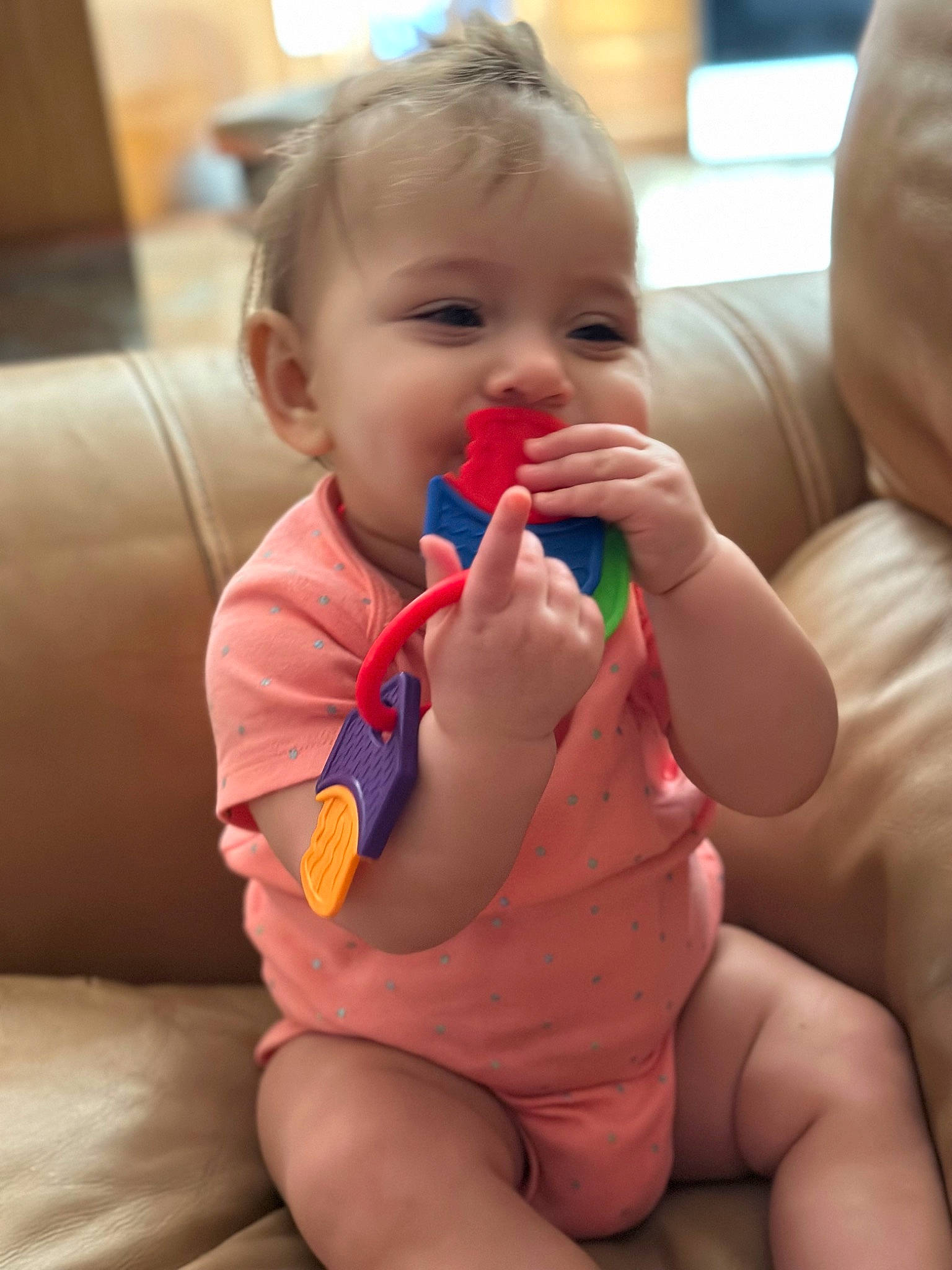 Arianna is registered to the contest to win money with this photo: baby, cheek, eye, finger, fun, gesture, hair, hand, happy, head, human_body, lip, mouth, nail, neck, nose, person, skin, smile, thumb