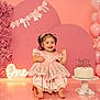 baby, child, birthday, cake, pink, dress, balloons, flowers, celebration, smiling, portrait, cute, decorations, happy, sitting, indoor, party, girl, pigtails, footwearless
