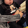 Kayron a rejoint le concours — aidez-le/la à gagner de superbes lots ! baby, blue_eyes, chair, child, costume, cute, ears, hands, hood, indoor, infant, jeans, lap, looking_up, mickey_mouse, plush, seated, striped_sleeve, surprised, yellow_booties