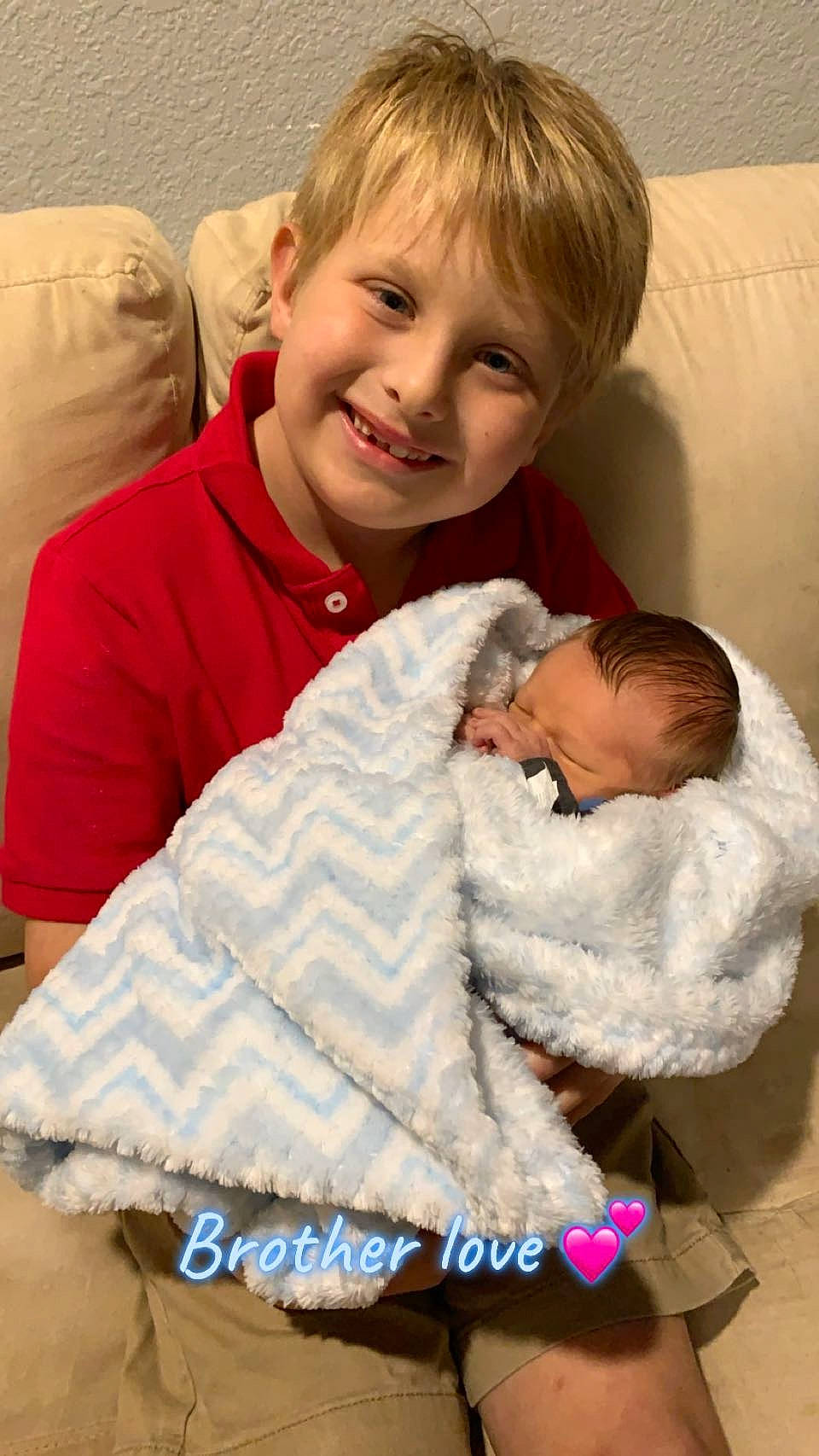 Kodi joined the competition — help win amazing prizes! baby, baby_toddler_clothing, cheek, child, comfort, couch, event, eye, face, fun, hairstyle, happy, head, joy, lap, person, room, sitting, skin, sleeve