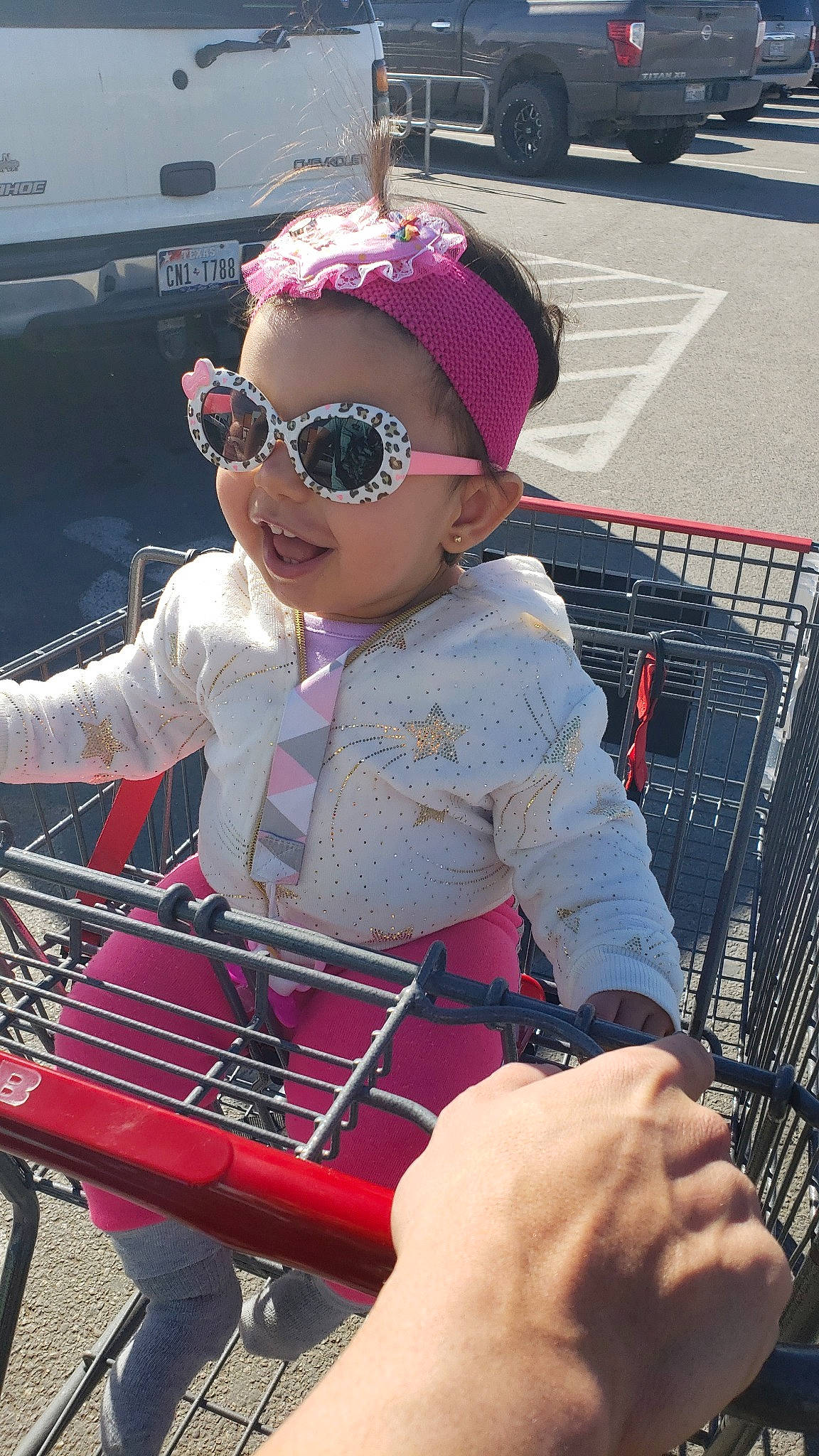 Angelina is registered to the contest to win money with this photo: cap, car, child, cool, eyewear, fashion_accessory, fun, girl, glasses, headgear, headwear, person, product, recreation, sunglasses, toddler, vacation, vision_care