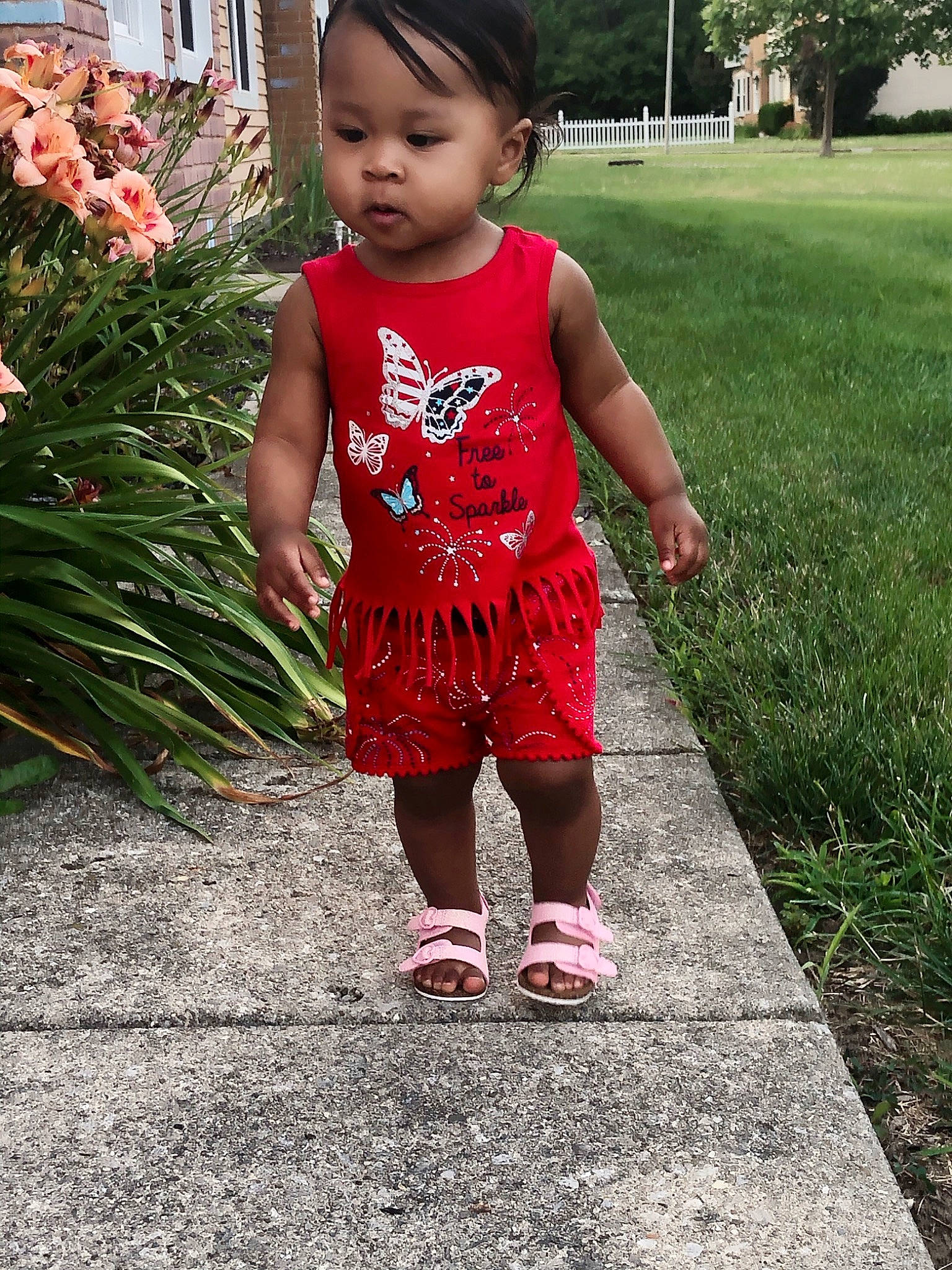 Kaiya joined the competition — help win amazing prizes! baby_toddler_clothing, beauty, child, clothing, dress, face, flower, flowerpot, grass, grass_family, happy, leaf, leisure, people_in_nature, person, pink, plant, sidewalk, summer, toddler