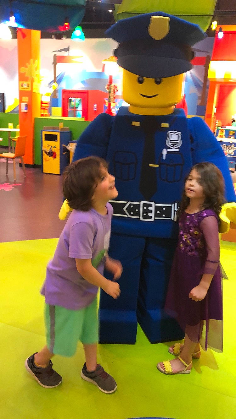 Hamza is registered to the contest to win money with this photo: child, fun, mascot, person, toy, world, yellow