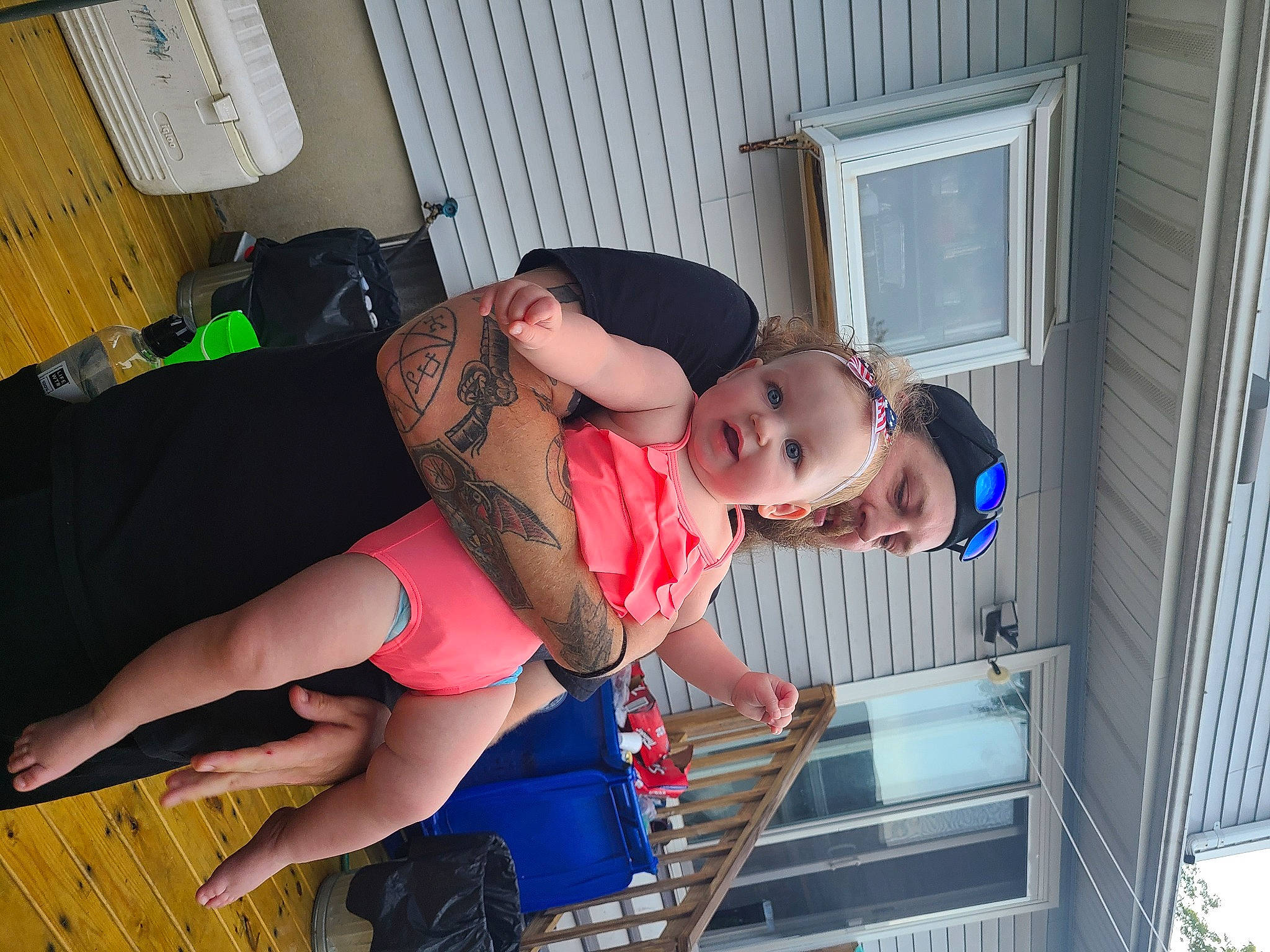 Cassidy joined the competition — help win amazing prizes! abdomen, baby, barefoot, chest, child, foot, fun, happy, headwear, human_leg, knee, leisure, person, room, sandal, shorts, sitting, thigh, toddler, trunk