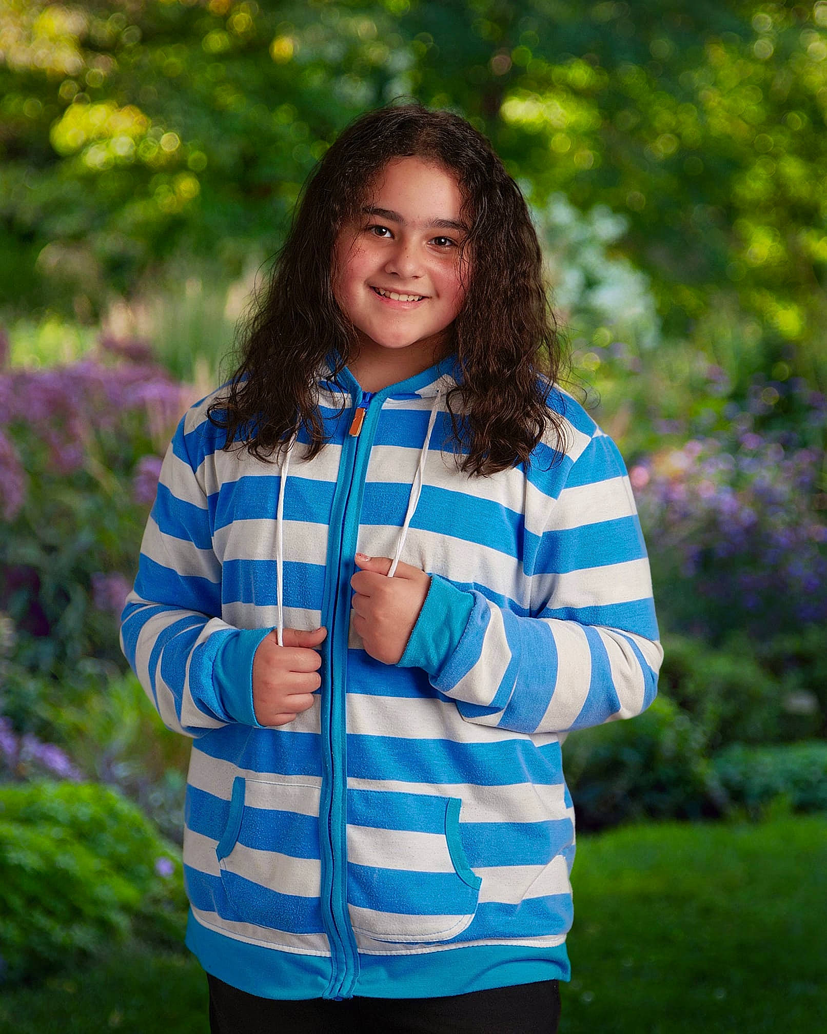 Madison is registered to the contest to win money with this photo: botany, electric_blue, face, facial_expression, flash_photography, gesture, grass, hair, hairstyle, happy, joy, leisure, outerwear, people_in_nature, person, plaid, plant, sleeve, smile, summer