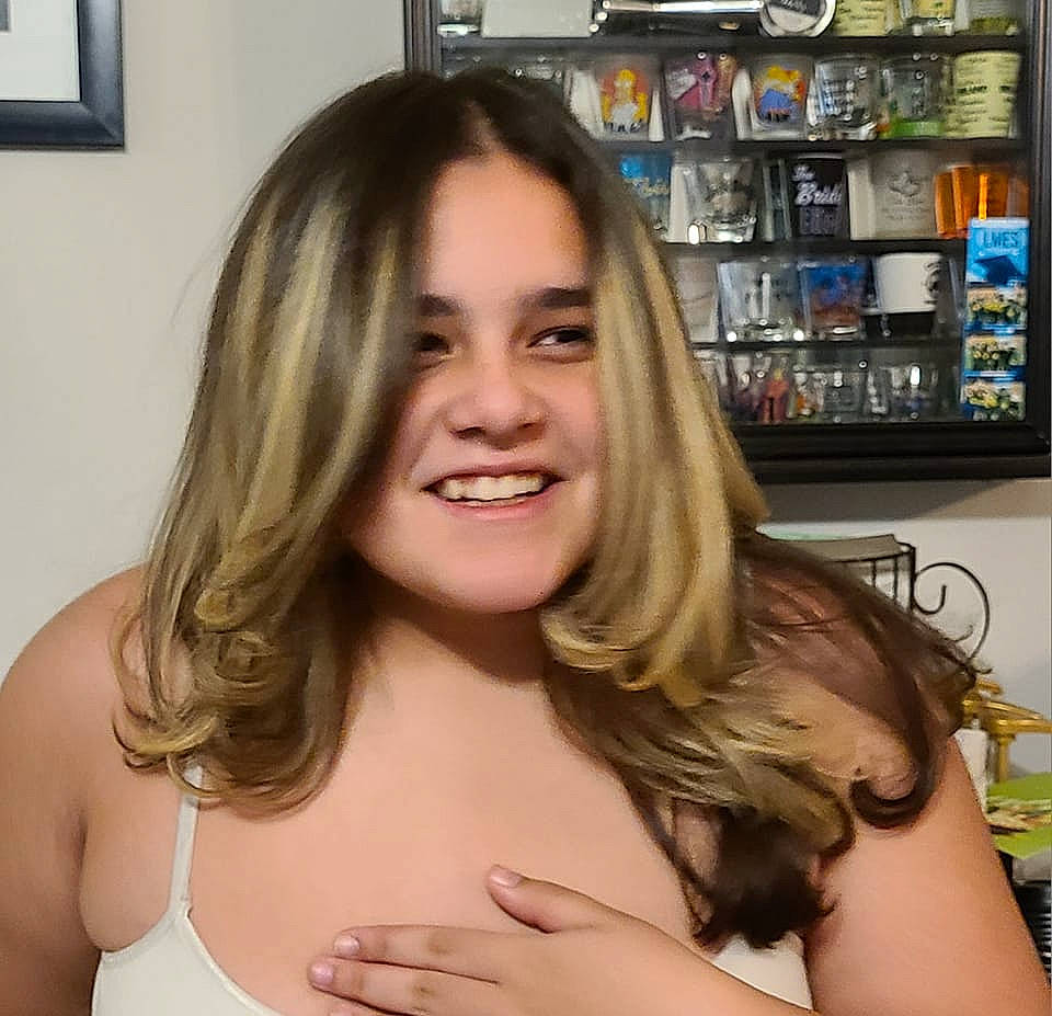 Madison is registered to the contest to win money with this photo: arm, cheek, chin, eye, eyebrow, eyelash, gesture, iris, jaw, joint, joy, lip, mouth, muscle, neck, nose, organ, person, picture_frame, shoulder