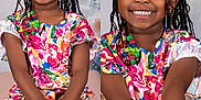 Laila joined the competition — help win amazing prizes! accessories, beads, braided_hair, child, colorful_clothing, crossed_legs, cushion, fashion, feet, girl, happy, indoor, jewelry, legs, portrait, sitting, smiling, studio, window, young