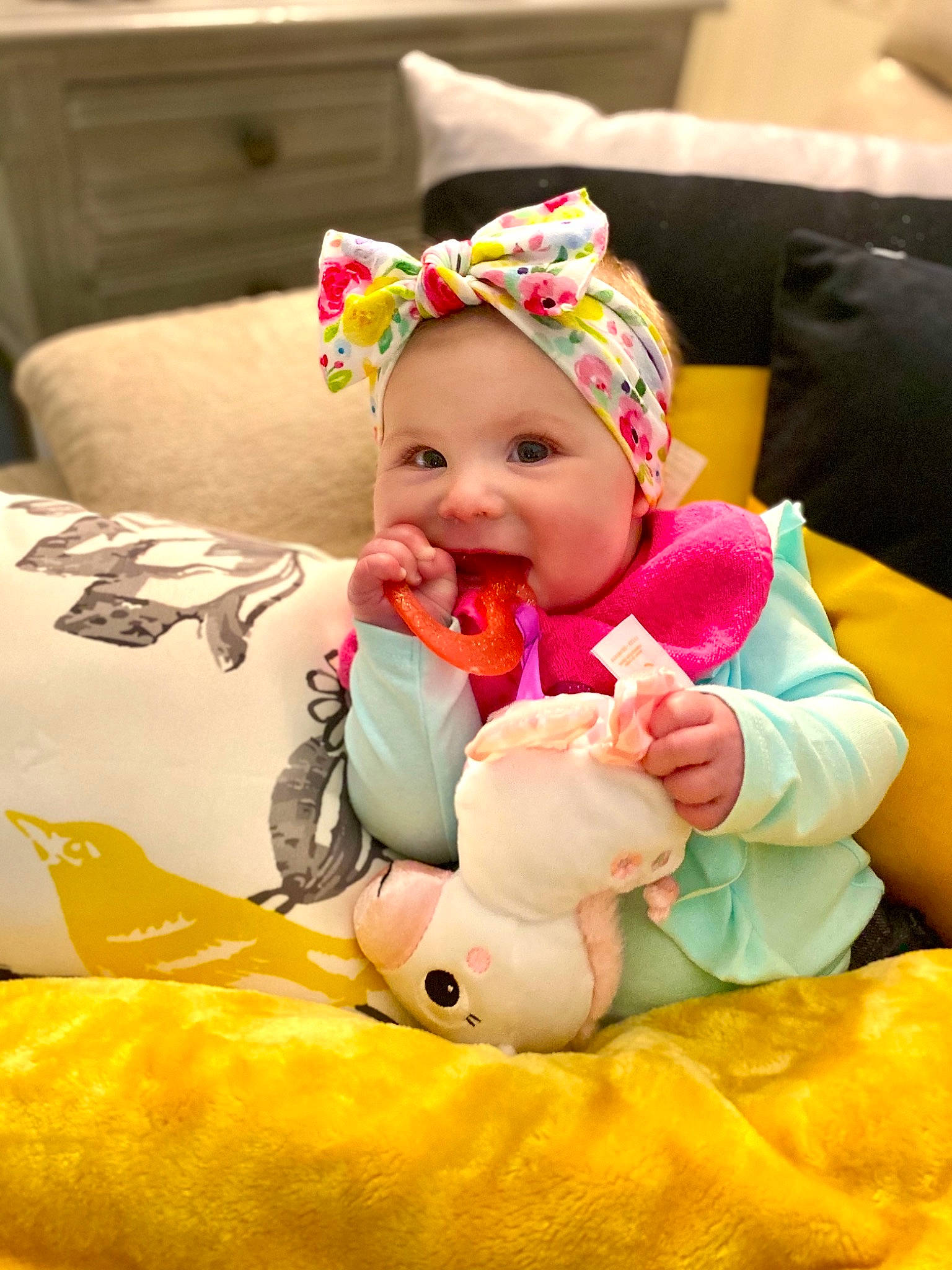 Sawyer joined the competition — help win amazing prizes! baby, baby_products, baby_toddler_clothing, child, comfort, face, facial_expression, fun, happy, head, headwear, linens, mammal, person, play, plush, room, sitting, smile, stuffed_toy
