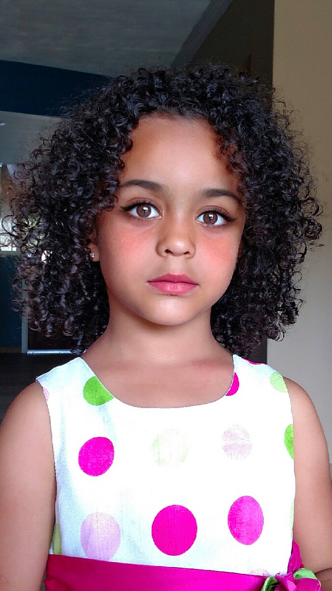Sofia is registered to the contest to win money with this photo: afro, beauty, black_hair, brown_hair, cheek, child, child_model, forehead, girl, hair, hair_coloring, hairstyle, human_hair_color, jheri_curl, lip, long_hair, person, pink, smile