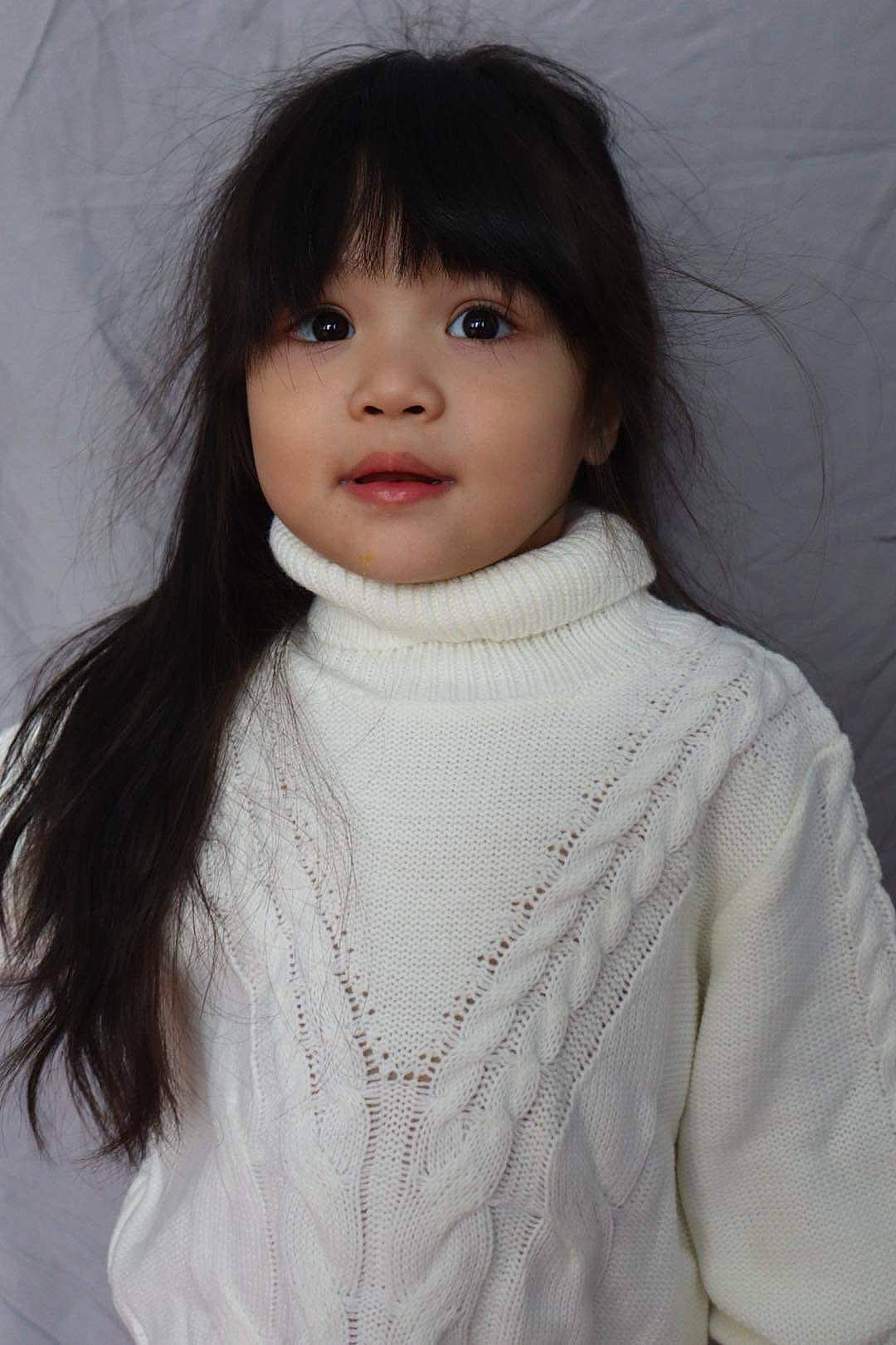 Nan joined the competition — help win amazing prizes! bangs, brown_hair, cheek, embellishment, eyelash, fashion_accessory, fashion_design, flash_photography, grey, headgear, hime_cut, iris, layered_hair, lip, outerwear, person, skin, sleeve, toddler, wool