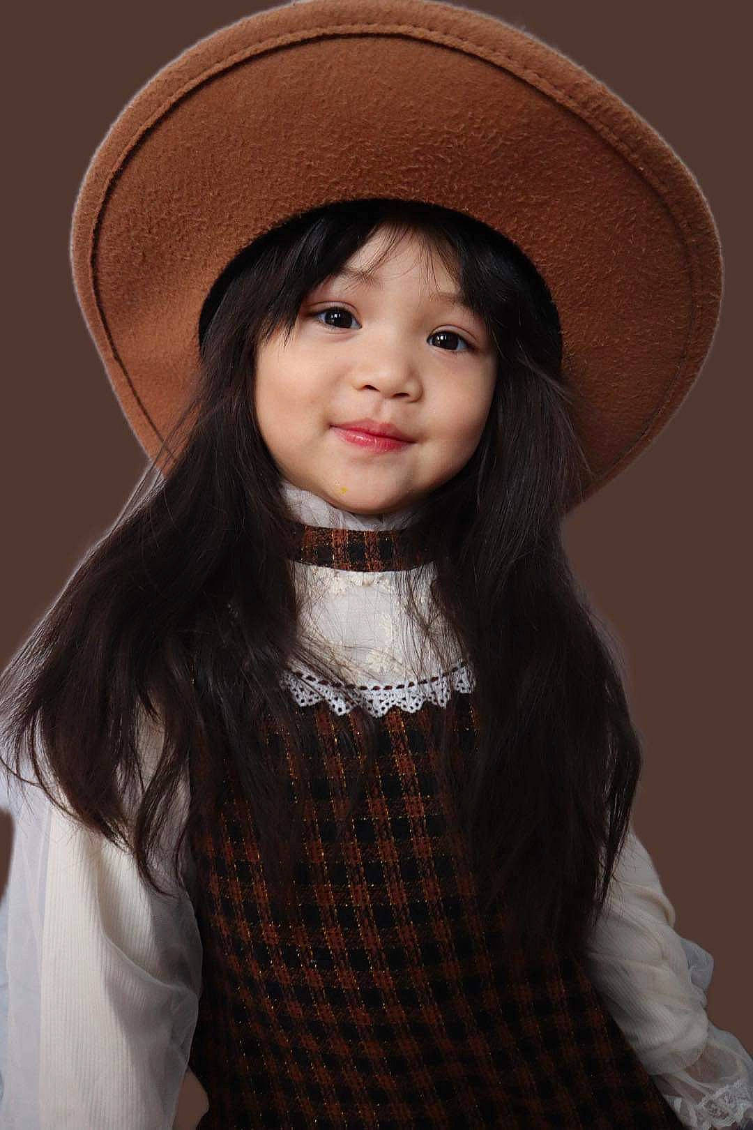 Nan joined the competition — help win amazing prizes! black, black_hair, chin, costume_hat, embellishment, eye, eyebrow, eyelash, fedora, flash_photography, hat, headgear, human_body, iris, joy, lip, organ, outerwear, person, sleeve