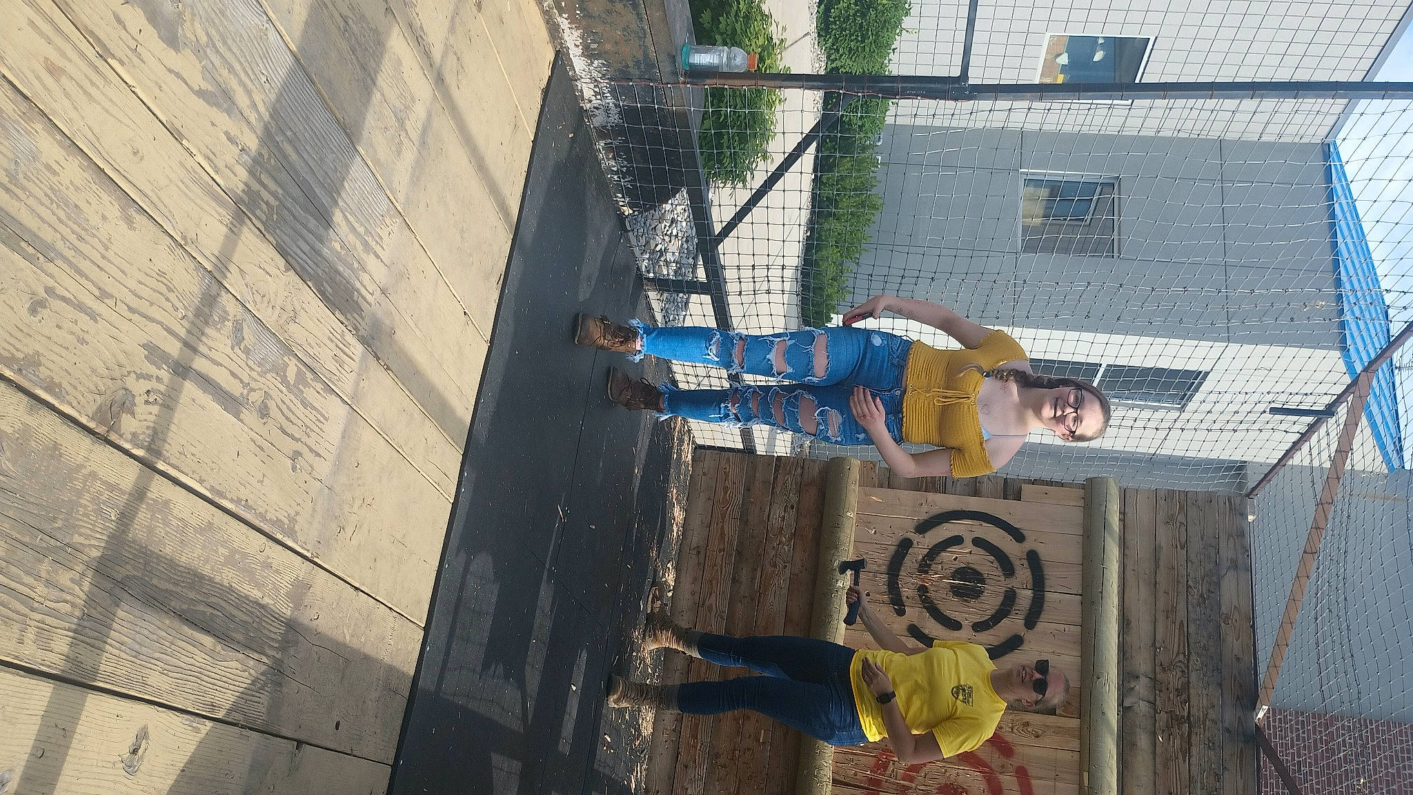 Makayla joined the competition — help win amazing prizes! art, building, city, daytime, facade, joy, mesh, pedestrian, person, road, street, transport, tree, window, wood