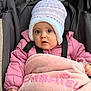 Gabriella a rejoint le concours — aidez-le/la à gagner de superbes lots ! baby, blanket, casual, child, cozy, curious, cute, face, indoor, infant, knit_hat, pacifier, person, pink_jacket, seated, soft_texture, stroller, warm, wide_eyes, winter_clothing