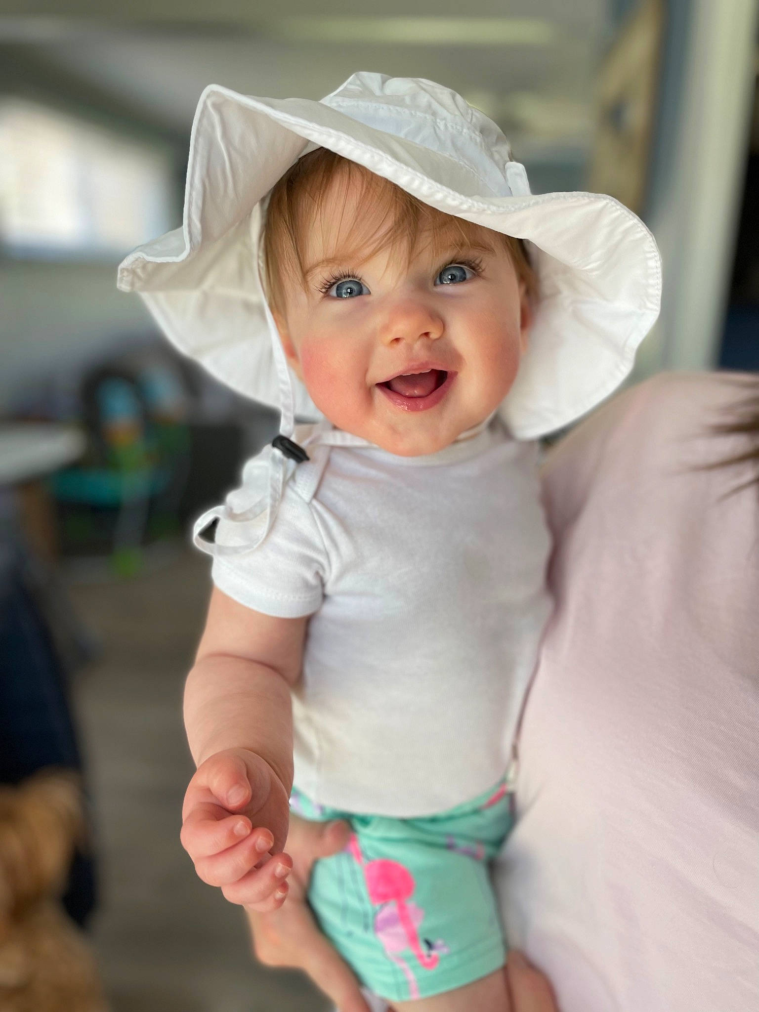 Lilyana joined the competition — help win amazing prizes! arm, baby, baby_toddler_clothing, cheek, eye, face, gesture, hand, happy, headgear, headwear, human_body, iris, lip, person, photograph, pink, skin, sleeve, smile