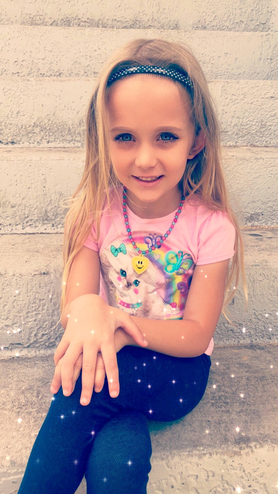 M'Kenzie joined the competition — help win amazing prizes! beauty, blue, cheek, child, day, eye, facial_expression, fun, girl, hair, hair_accessory, hairstyle, headgear, human_hair_color, joy, pattern, person, pink, sitting, skin