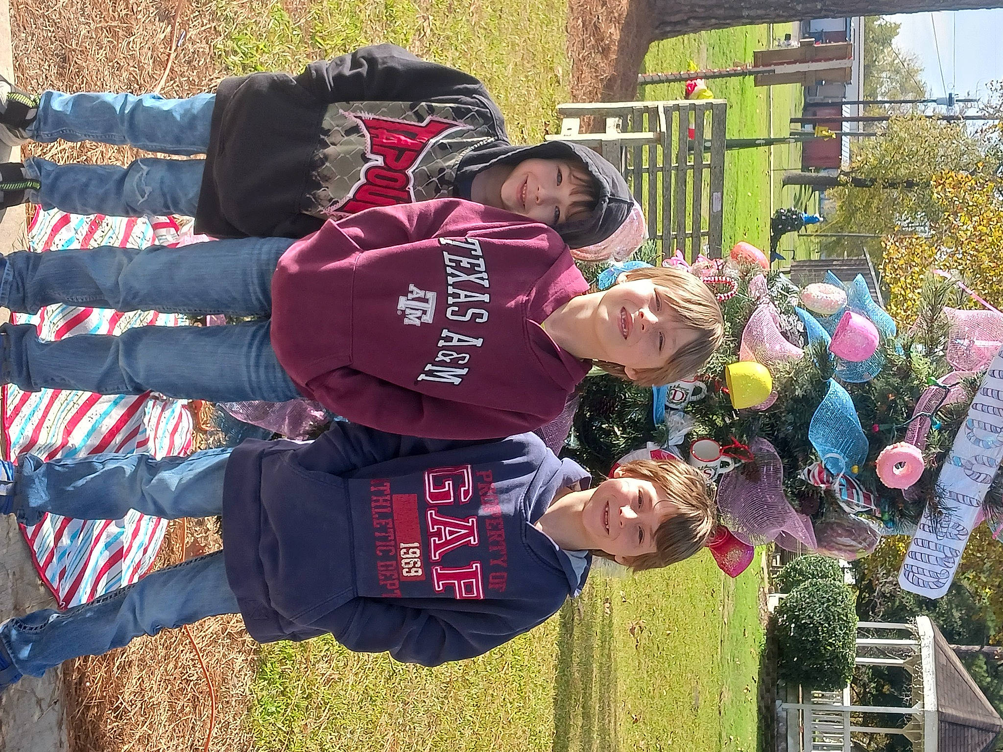 Curtis is registered to the contest to win money with this photo: child, event, fun, grass, hat, headwear, joy, leisure, person, plant, pole, recreation, t_shirt, toddler, tree, walking_shoe