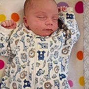 Avalon joined the competition — help win amazing prizes! baby, sleeping, infant, onesie, animal_print, blanket, polka_dot, cute, peaceful, child, newborn, soft, cozy, resting, portrait, face, hand, zipped, colorful, indoors