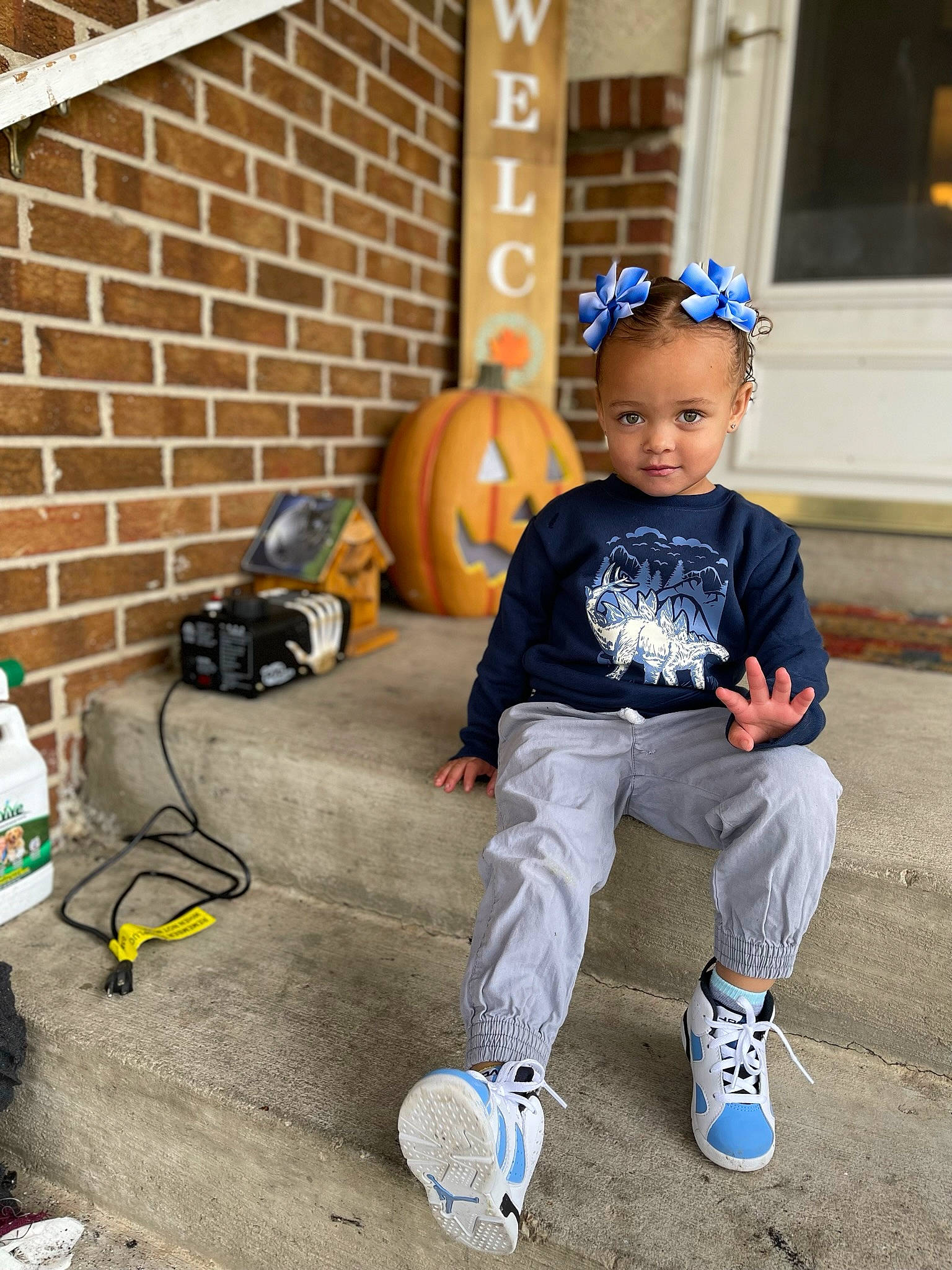 Amora joined the competition — help win amazing prizes! baby_toddler_clothing, boot, calabaza, child, denim, electric_blue, flooring, fun, knee, leg, orange, person, personal_protective_equipment, pumpkin, shoe, sitting, sneakers, sportswear, t_shirt, toddler