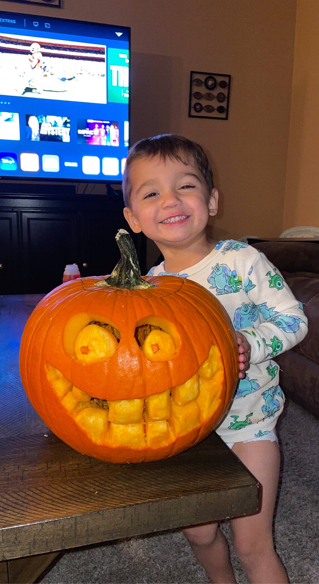 Arlo is registered to the contest to win money with this photo: calabaza, cucurbita, eye, fruit, gourd, happy, head, human_body, jack_o_lantern, joy, mouth, natural_foods, orange, organ, output_device, person, plant, pumpkin, smile, squash