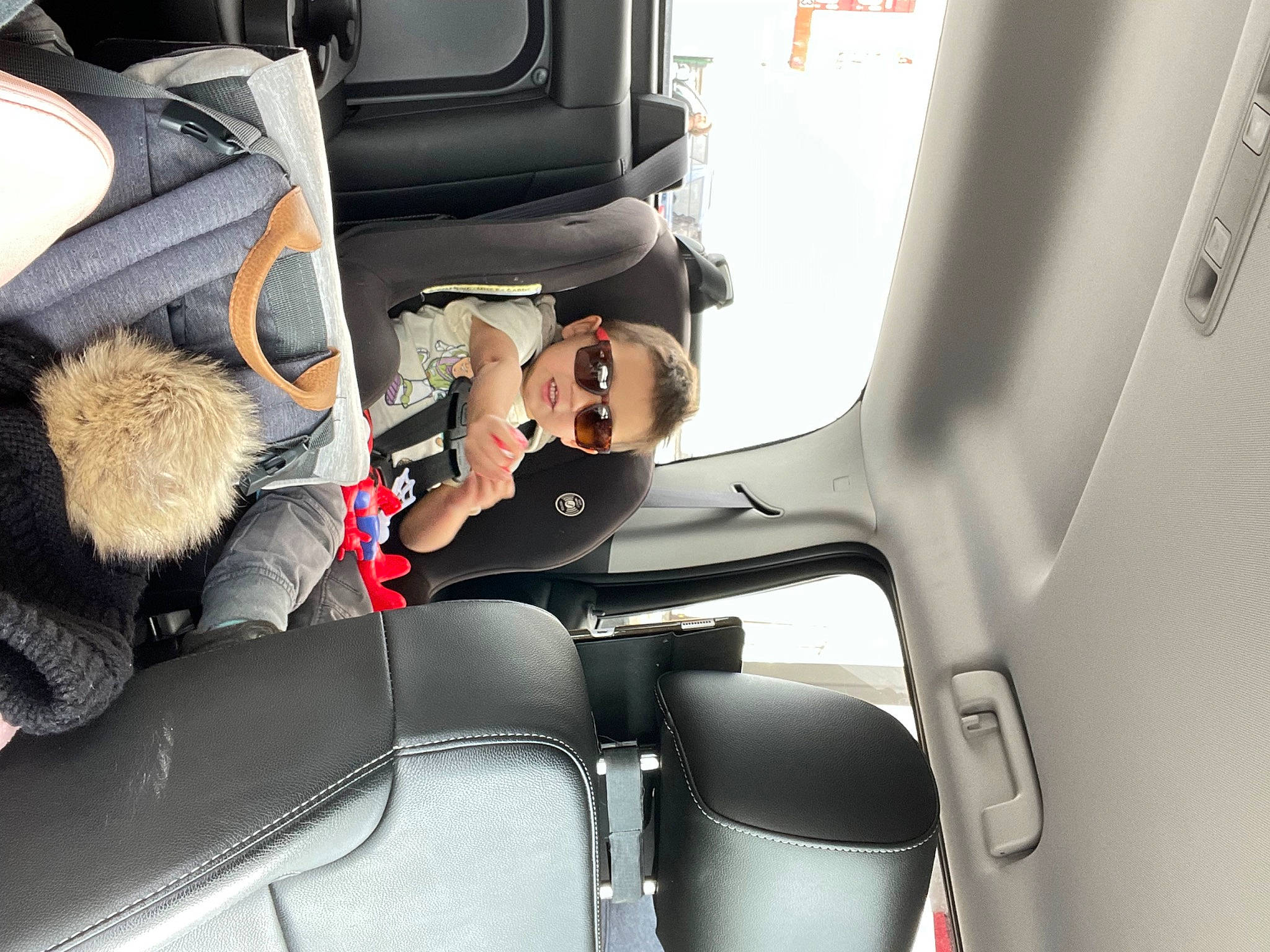Arlo joined the competition — help win amazing prizes! air_travel, airline, auto_part, automotive_design, automotive_exterior, car_seat, car_seat_cover, comfort, eyewear, family_car, goggles, head_restraint, luxury_vehicle, mode_of_transport, motor_vehicle, passenger, person, seat_belt, sunglasses, vehicle