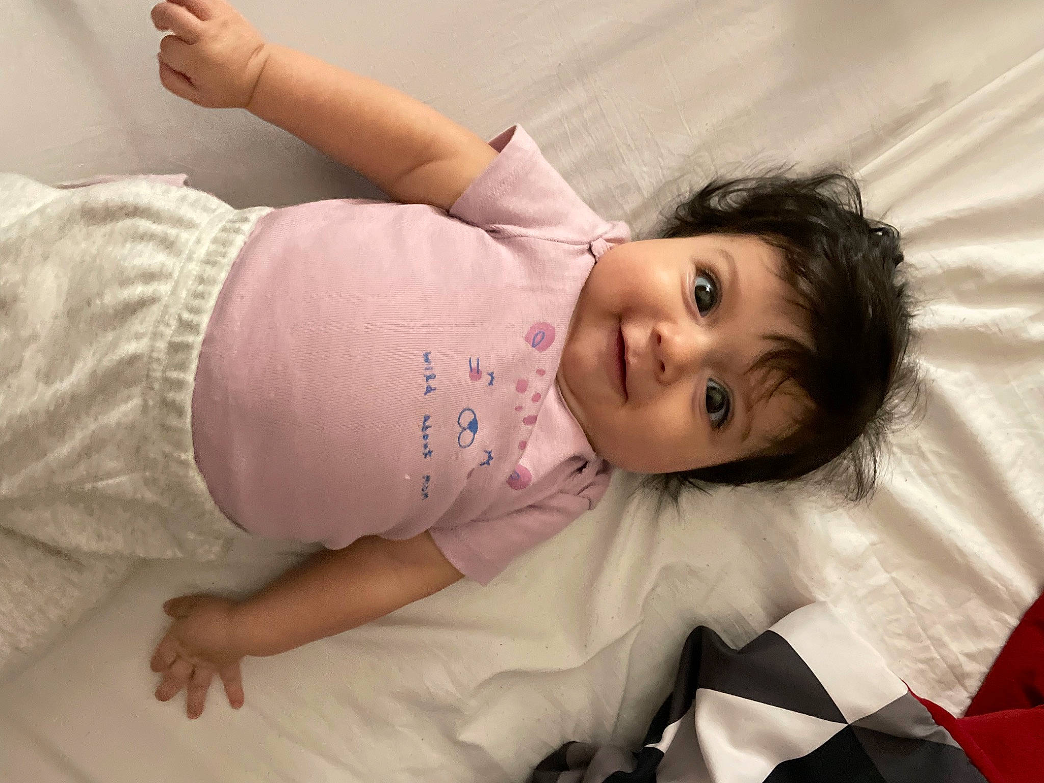 Adaleigh is registered to the contest to win money with this photo: arm, comfort, eye, eyelash, face, flash_photography, gesture, hair, hairstyle, happy, iris, joint, lip, mammal, person, pink, skin, sleeve, smile, textile