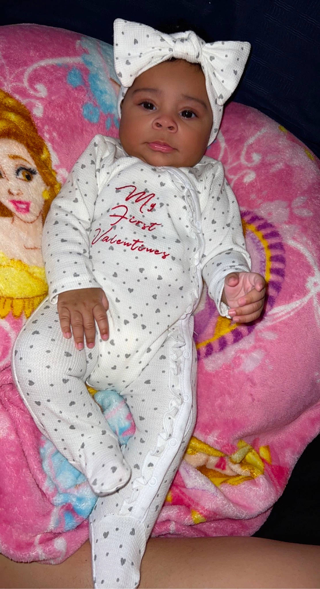 Londyn joined the competition — help win amazing prizes! arm, baby, baby_toddler_clothing, cheek, doll, face, hand, happy, head, headwear, human_body, lip, magenta, organ, pattern, person, pink, purple, skin, sleeve