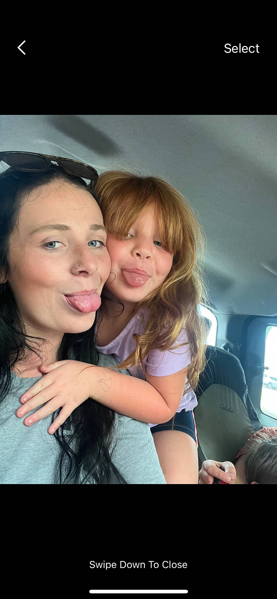 Evalynn is registered to the contest to win money with this photo: automotive_design, blond, brown_hair, child, event, face, family_car, flash_photography, fun, gesture, happy, iris, jewellery, joy, laugh, lip, long_hair, luxury_vehicle, person, sitting