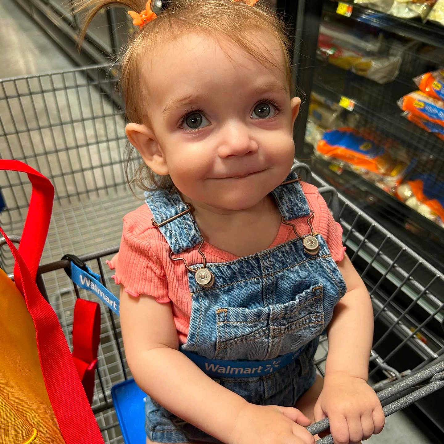 Sage is registered to the contest to win money with this photo: accessories, baby, bag, city, clothing, face, handbag, head, indoors, jeans, pants, person, photography, portrait, road, shop, shopping, shoppingcart, street, urban