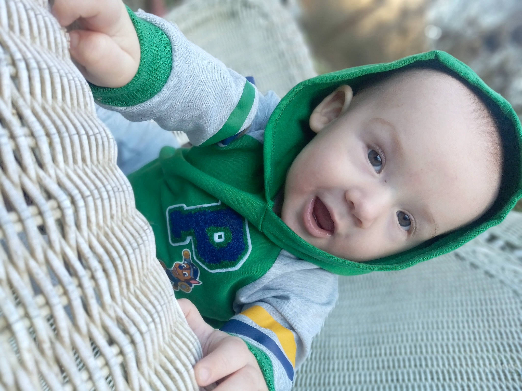 Samuel is registered to the contest to win money with this photo: baby, baby_toddler_clothing, cheek, child, comfort, eye, finger, fun, grass, green, hairstyle, happy, human_body, nose, person, skin, sleeve, smile, thumb, toddler