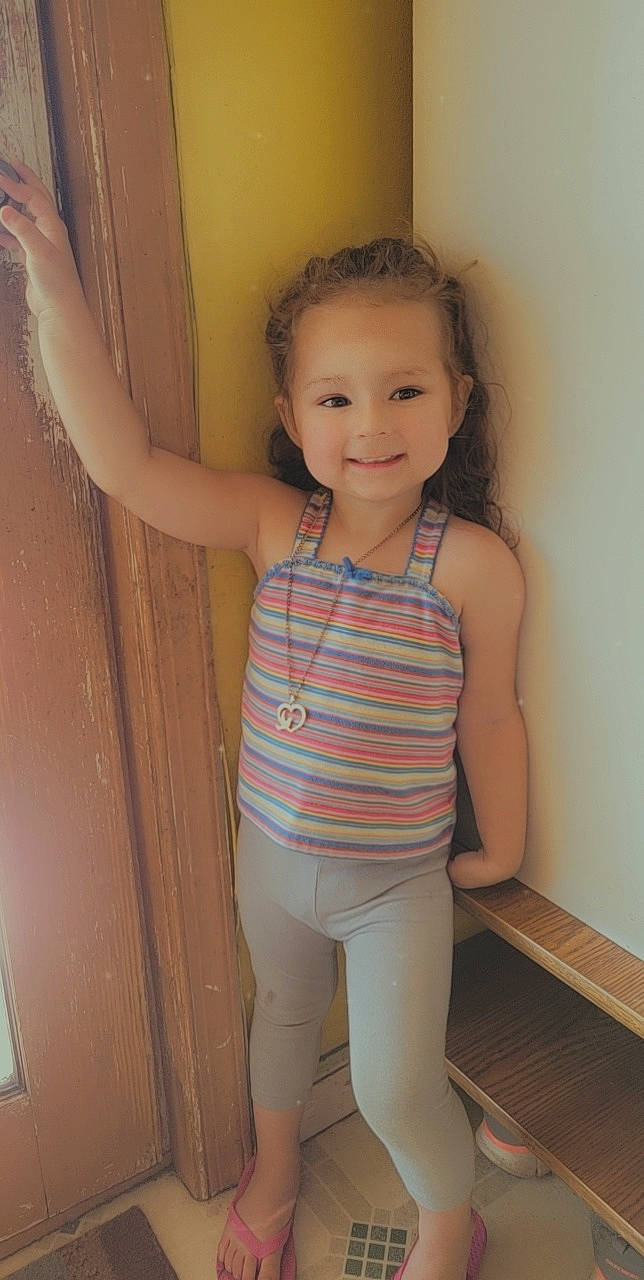 Adalynn is registered to the contest to win money with this photo: chin, eye, face, finger, hair, hairstyle, head, human_body, iris, joint, joy, leg, muscle, neck, person, shoulder, sleeve, smile, standing, textile