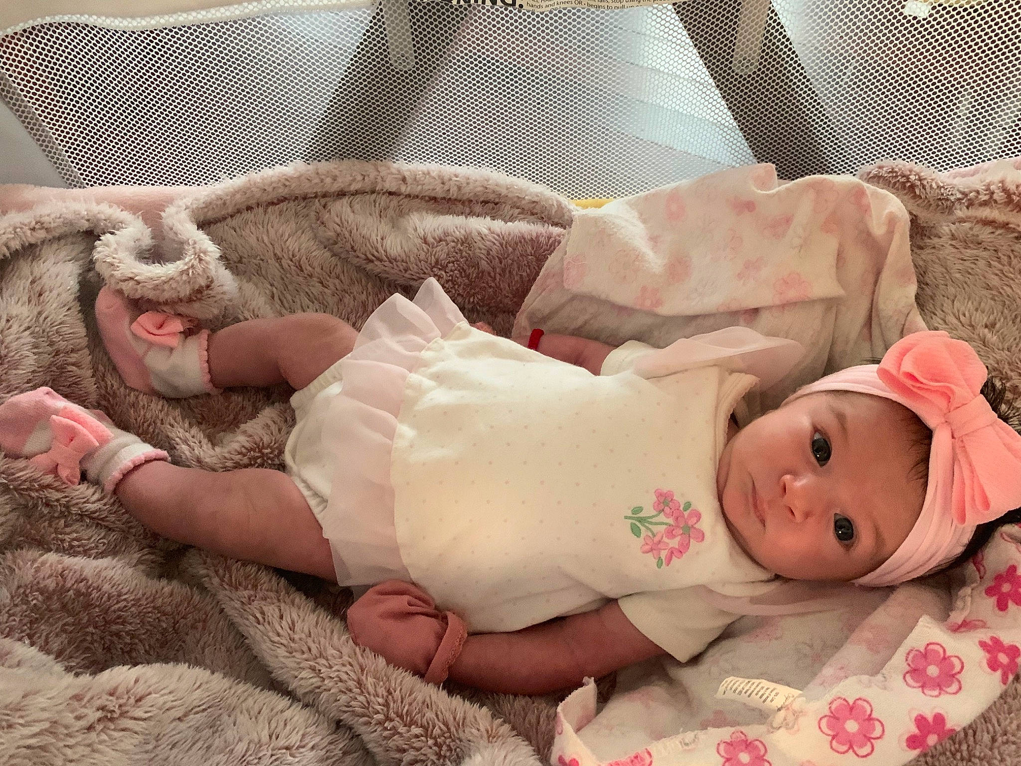 Cataleya is registered to the contest to win money with this photo: arm, baby, baby_sleeping, baby_toddler_clothing, comfort, dress, eye, grass, happy, hat, headgear, headwear, human_body, leg, linens, lip, mouth, person, pink, skin