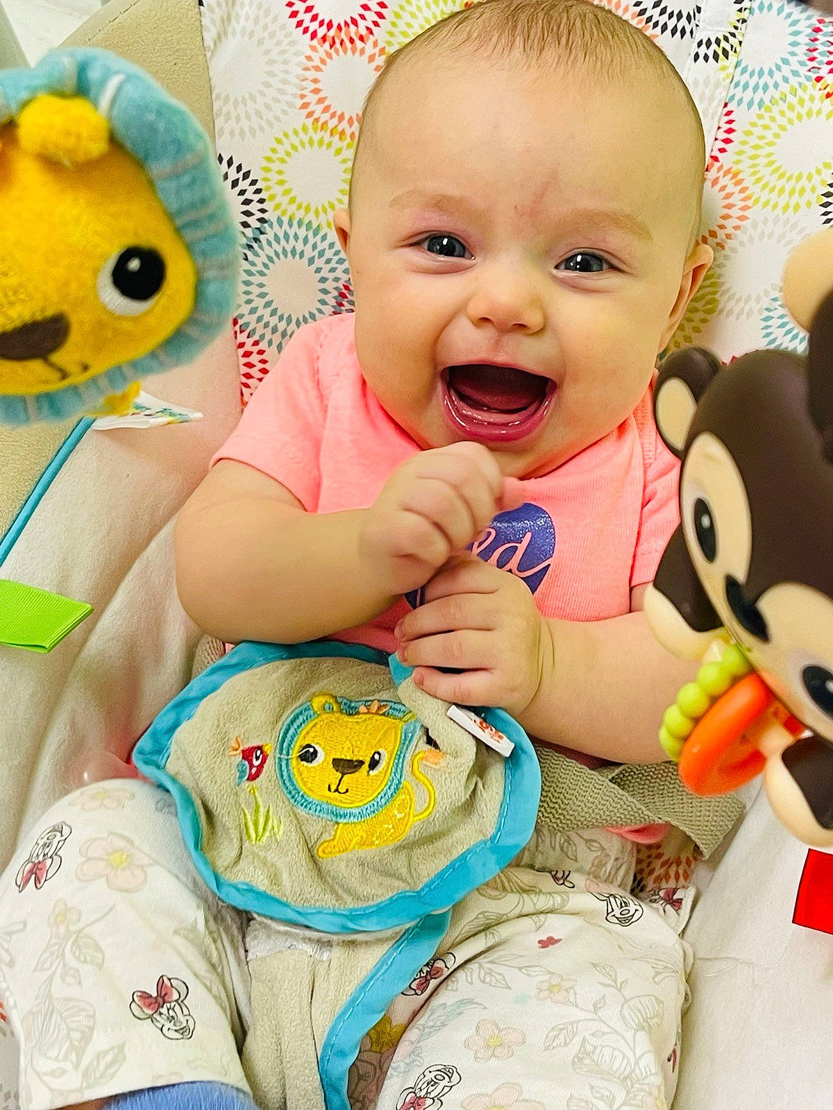Aspen is registered to the contest to win money with this photo: baby, baby_laughing, baby_playing_with_toys, baby_products, baby_toddler_clothing, cheek, child, facial_expression, finger, fun, happy, mammal, people, person, playing_with_kids, product, skin, smile, textile, toddler