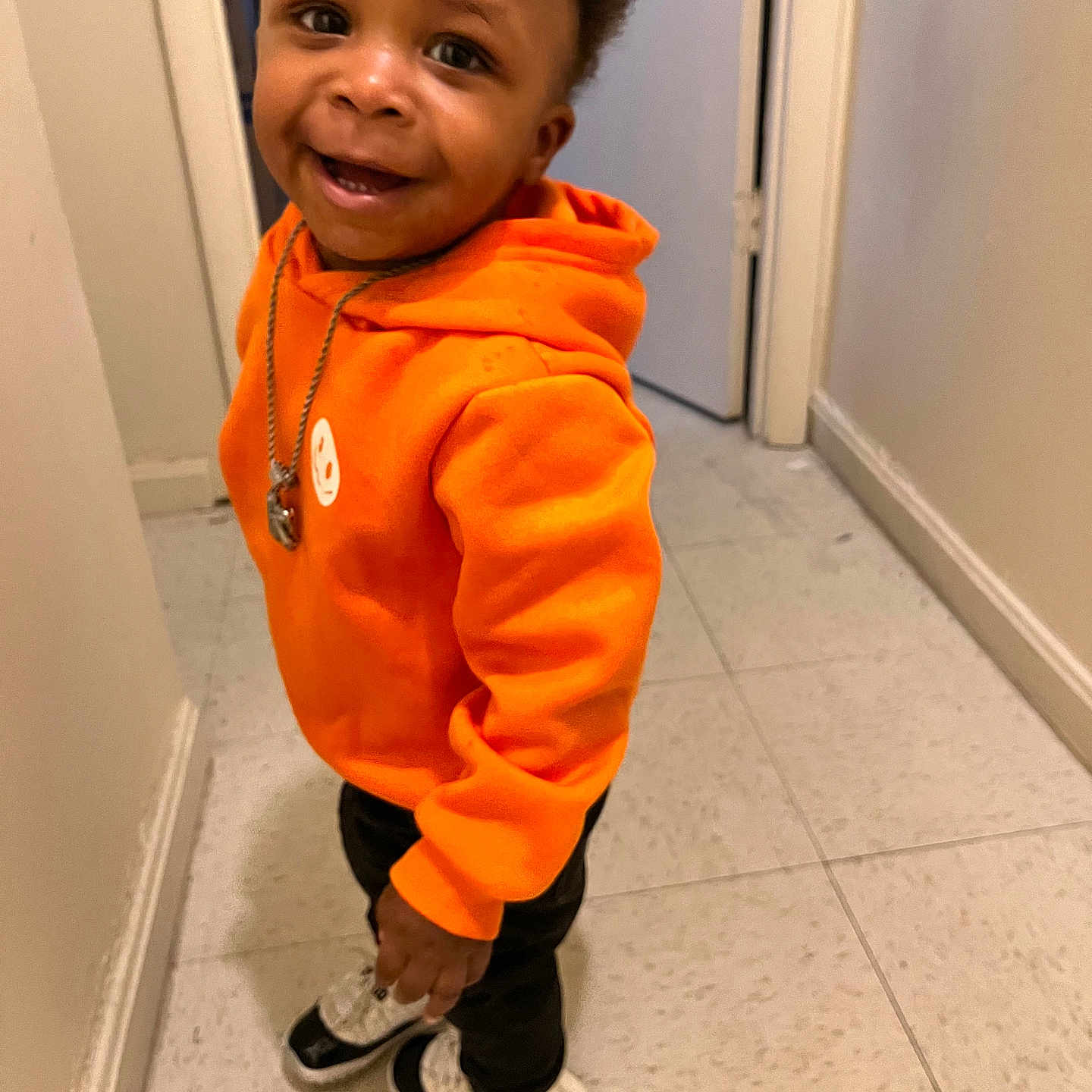 Kashmere is registered to the contest to win money with this photo: boy, child, clothing, coat, face, footwear, happy, head, jacket, knitwear, longsleeve, male, pants, person, photography, portrait, shoe, sleeve, smile, sweater