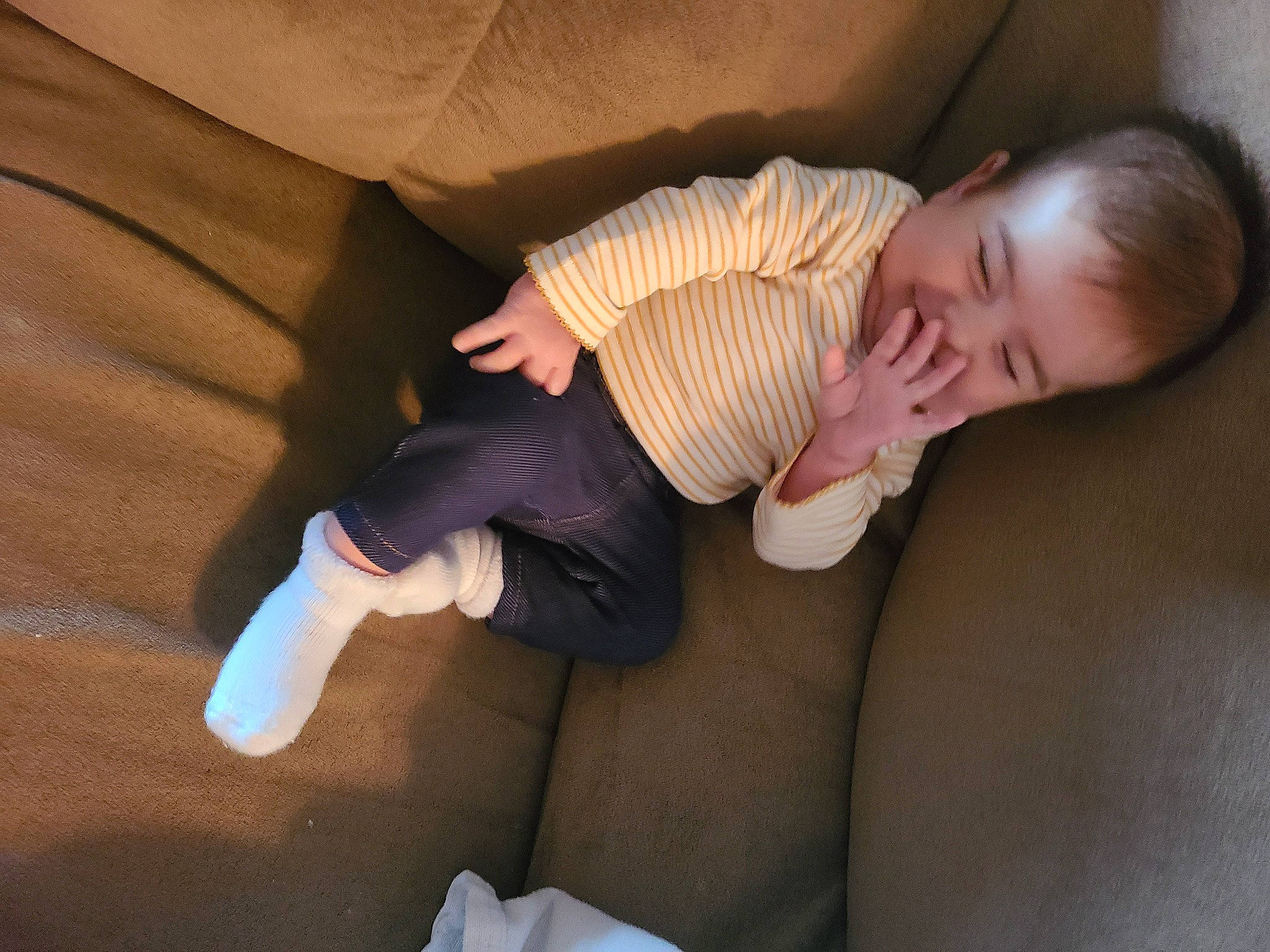 Jenaveve joined the competition — help win amazing prizes! arm, baby_toddler_clothing, comfort, finger, floor, flooring, gesture, hand, human_body, joint, knee, lap, leg, person, skin, sleeve, sock, textile, thigh, toddler
