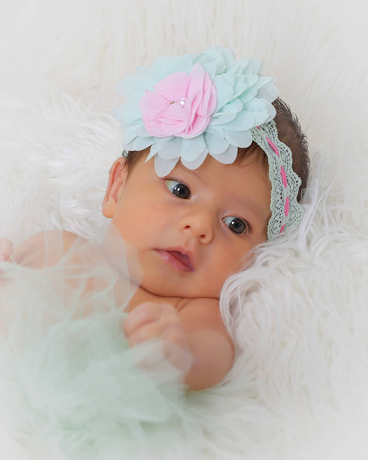 Jenaveve is registered to the contest to win money with this photo: baby, baby_toddler_clothing, bridal_accessory, cap, child, costume_hat, embellishment, eyelash, flower, happy, head, headband, headgear, headpiece, headwear, linens, person, petal, picture_frame, pink