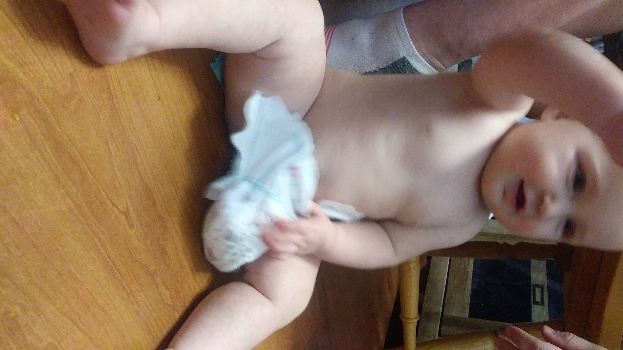 Gentry joined the competition — help win amazing prizes! abdomen, baby, barechested, chest, comfort, diaper, elbow, finger, gesture, hand, human_leg, nail, navel, person, stomach, thumb, toddler, toe, trunk, wood