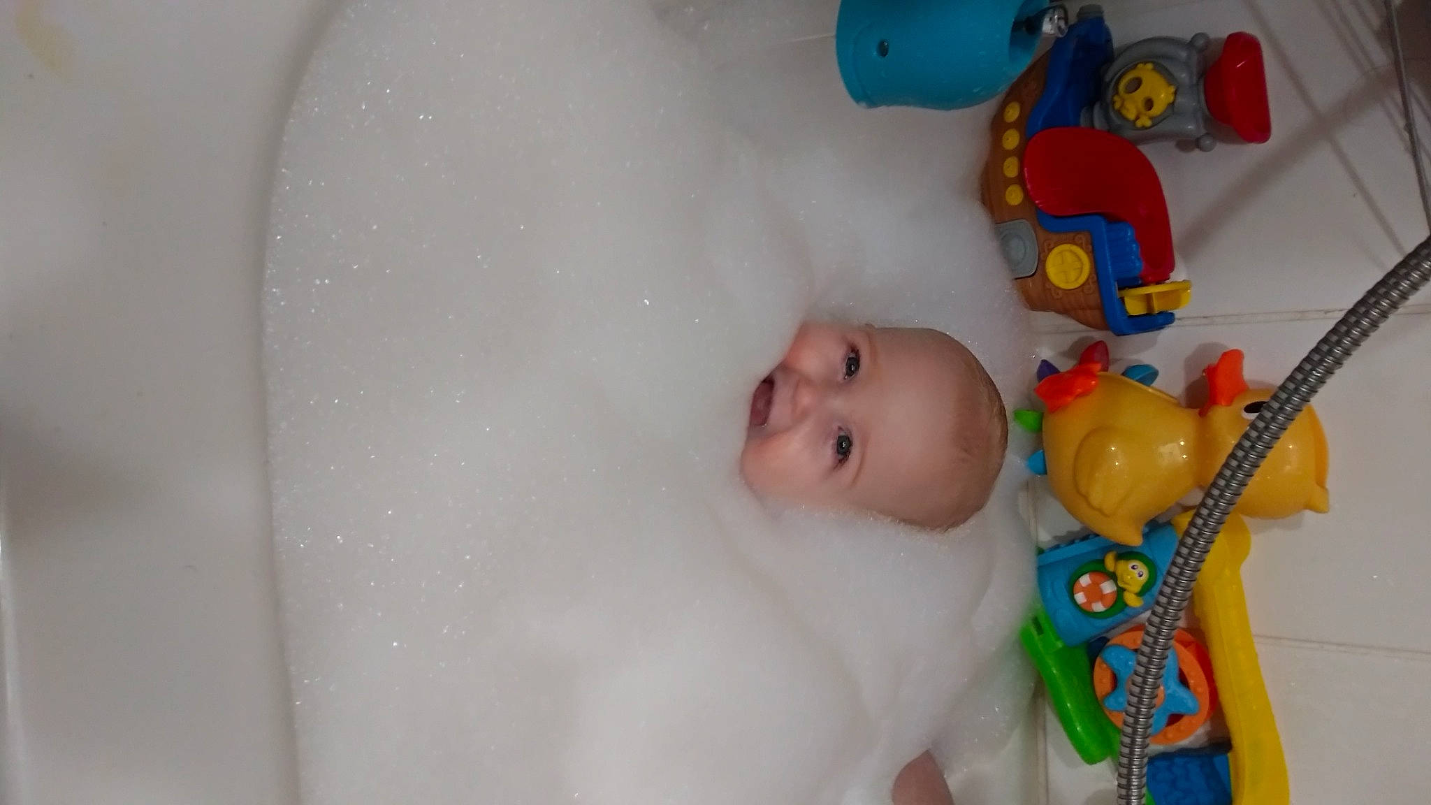 Gentry is registered to the contest to win money with this photo: baby, baby_products, baby_safety, baby_toddler_clothing, baby_toys, bathing, bathtub, child, cradle, fun, infant_bed, person, plastic, plush, room, stuffed_toy, toddler, toy