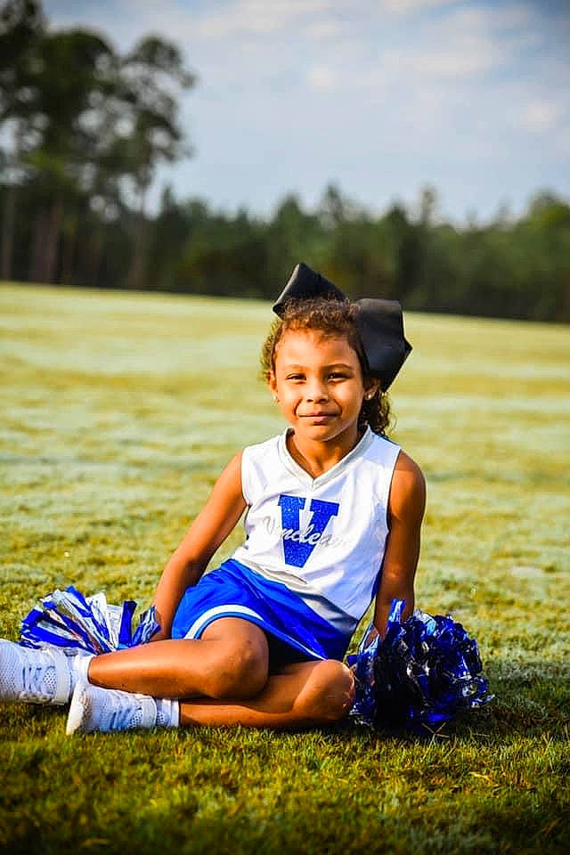 Aniah joined the competition — help win amazing prizes! cloud, electric_blue, face, flash_photography, grass, grass_family, grassland, happy, hat, joy, leisure, meadow, nature, people_in_nature, person, recreation, shoe, sky, smile, summer