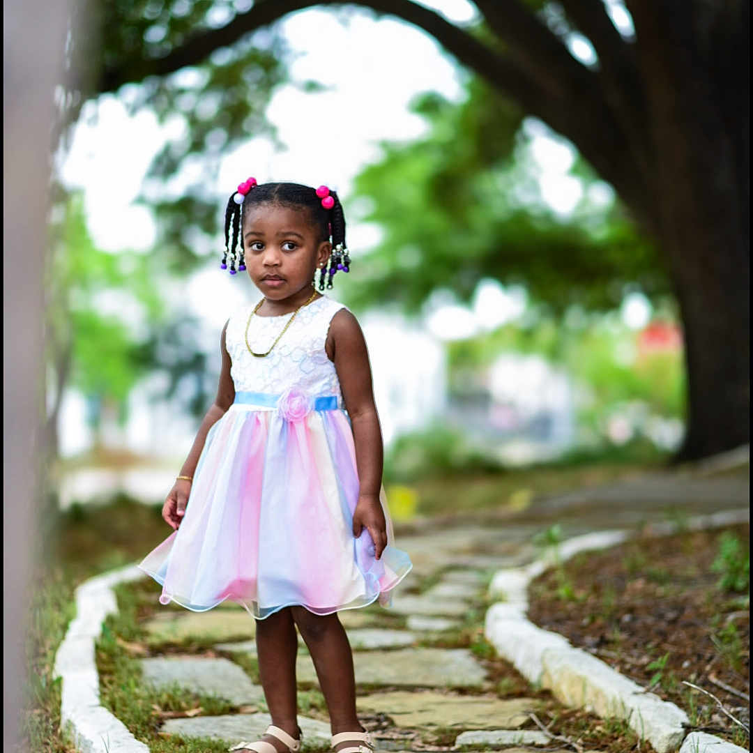 London Addison joined the competition — help win amazing prizes! bodypart, child, clothing, dress, eveningdress, face, female, flagstone, formalwear, girl, happy, head, path, person, photography, portrait, road, sitting, smile, walkway