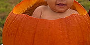 Dolly is registered to the contest to win money with this photo: baby, pumpkin, headband, bow, outdoor, sunset, blanket, grass, sidewalk, cute, infant, smiling, fall, autumn, child, diaper, legs, face, portrait, holiday